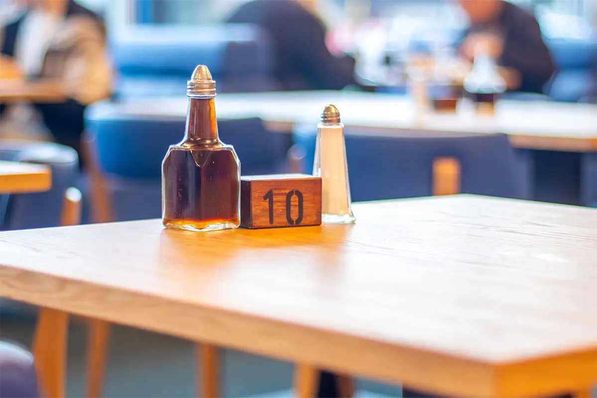 Salt and Vinegar on table 10 in Palmers Fish & Chips