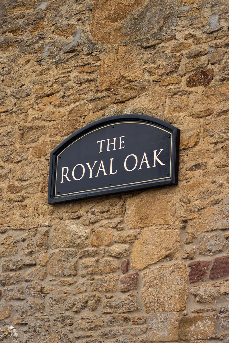 The Royal Oak Over Stratton Sign on side of the pub