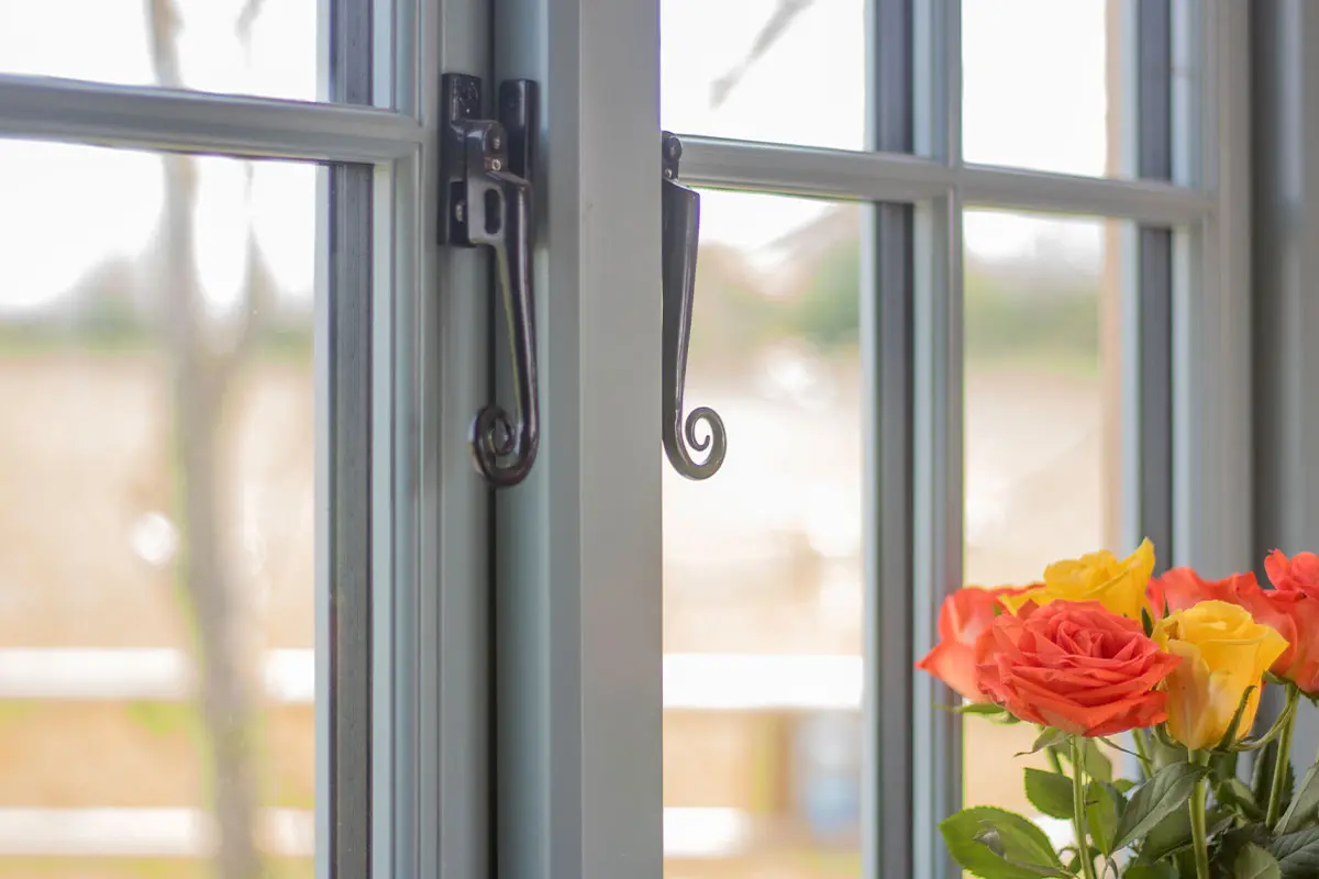 Up close photograph of a window in a shepherds hut